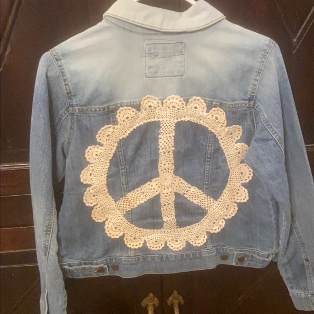 Ombréd jacket with a crocheted style peace sign